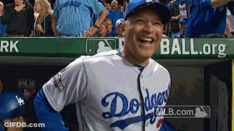 Man In Dodgers Jersey Laughing In Dugout GIF