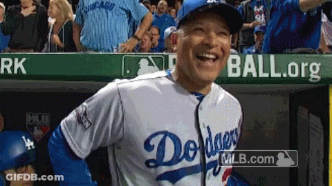 Man In Dodgers Jersey Laughing In Dugout GIF