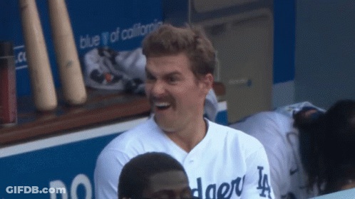 Man In Dodgers Jersey Laughs In Dugout GIF