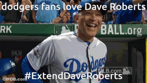 Man In Dodgers Jersey Smiling In Front Of Ball.org Banner GIF