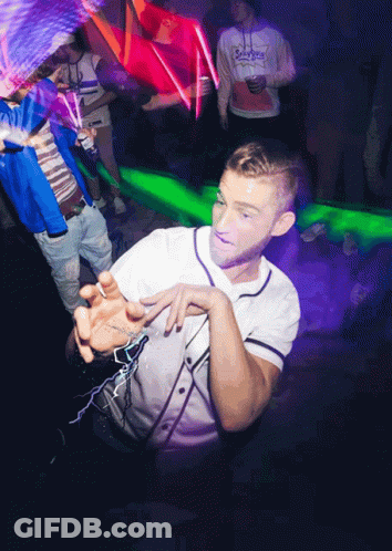 Man In Dodgers Sweatshirt Dancing In Crowd GIF