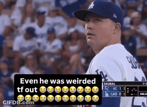 Man In Dodgers Uniform Looking At Crowd GIF