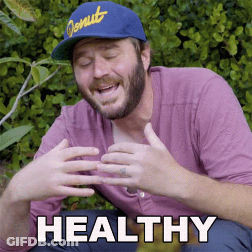 Man In Donut Hat And Purple Shirt Saying Healthy GIF