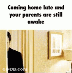 Man In Doorway Coming Home Late Parents Awake GIF