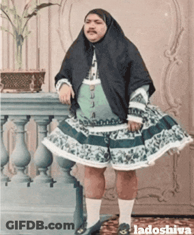 Man In Dress Next To Railing Ladoshiva GIF
