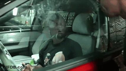 Man In Driver's Seat With Mouth Open GIF