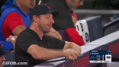 Man In Dugout Watching Baseball Game GIF