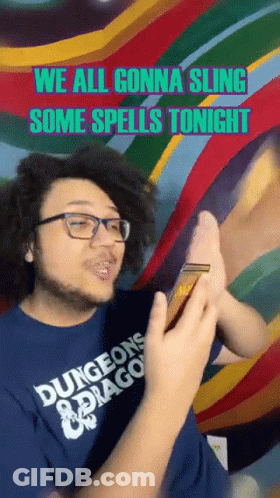 Man In Dungeons And Dragons Shirt Holding Phone GIF