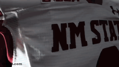 Man In E-USA NM State Football Jersey GIF