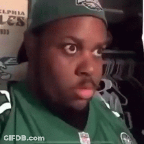Man In Eagles Jersey And Hat Making Funny Face GIF