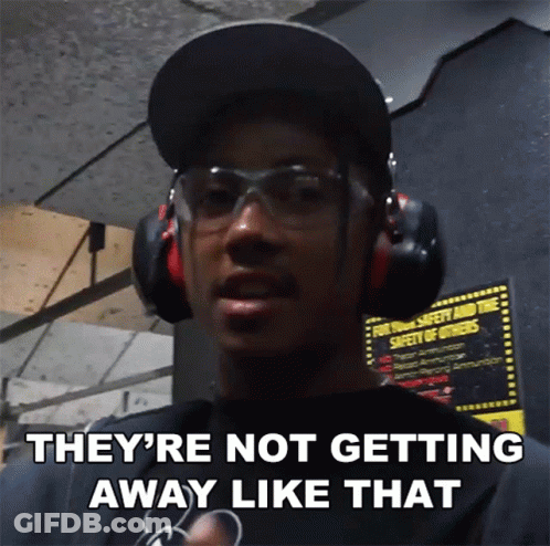 Man In Ear Muffs And Hat Saying They're Not Getting Away Like That GIF