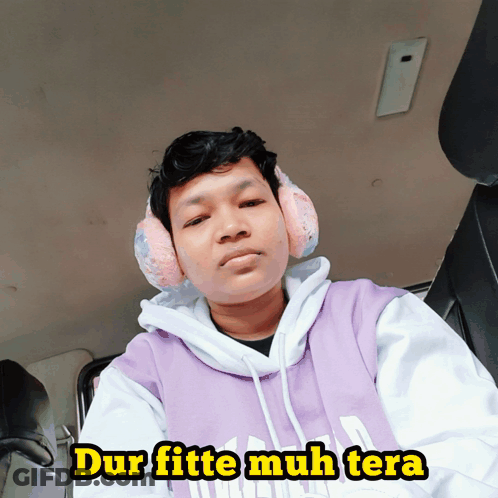 Man In Ear Muffs And Purple Hoodie Saying Dur Fitte Muh Tera GIF