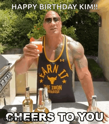 Man In Earn It Shirt Holding Drink GIF