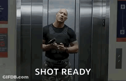 Man In Elevator Holding Gun Saying Shot Ready GIF
