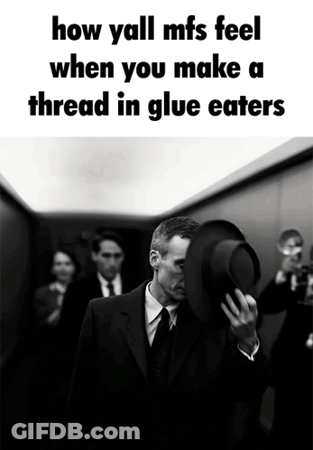 Man In Elevator Surprised By Thread In Glue GIF