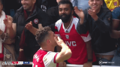 Man In Emirates Fly Better Shirt In Crowd GIF