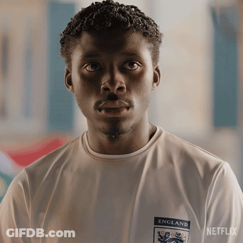 Man In England Shirt Looking At Camera GIF
