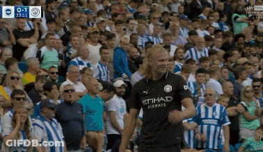 Man In Etihad Airways Jersey In Crowd GIF