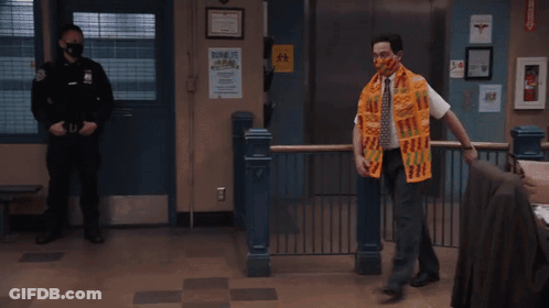 Man In Face Mask And Scarf Saying African GIF
