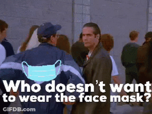 Man In Face Mask Facing Crowd GIF