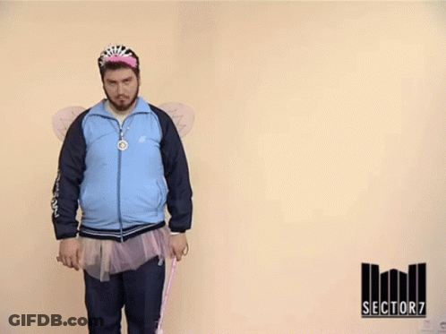 Man In Fairy Costume Holding Money In Front Of Fane Trotil Si Asociati Sign GIF