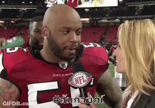 Man In Falcons Jersey Being Interviewed GIF