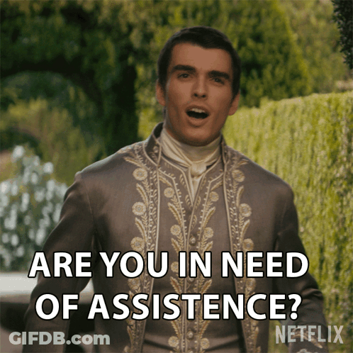Man In Fancy Suit Saying Are You In Need Of Assistance GIF
