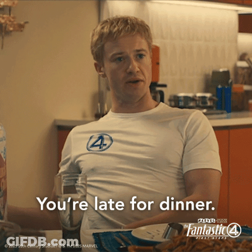 Man In Fantastic 4 Shirt At Table With Food GIF