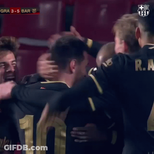 Man In FC Barcelona Jersey Hugging Another Man GIF