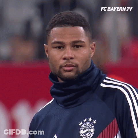 Man In FC Bayern Jersey On Red Field GIF