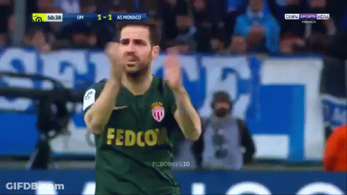 Man In Fedco Jersey Applauds In Crowd GIF