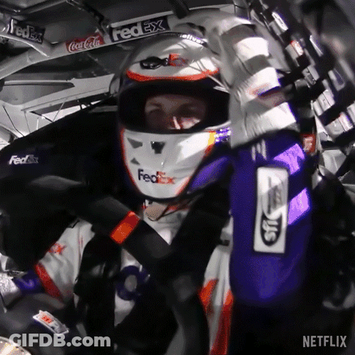 Man In FedEx Helmet Sitting In Race Car GIF