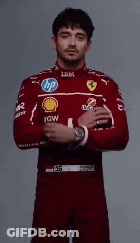 Man In Ferrari Uniform Adjusting Watch GIF