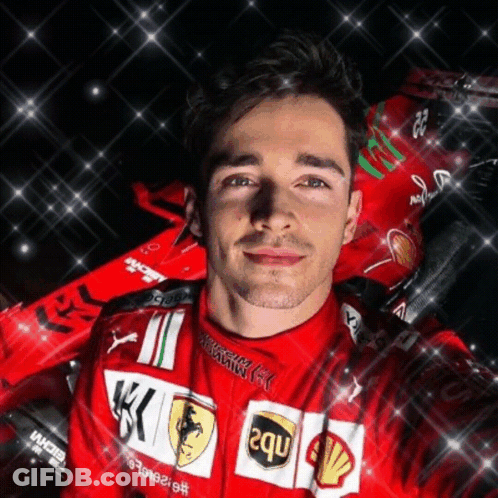 Man In Ferrari Uniform Taking Photo GIF