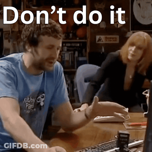 Man In Fifty Cents Shirt Sitting GIF