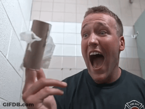 Man In Fire Dept Shirt Holding Toilet Paper GIF
