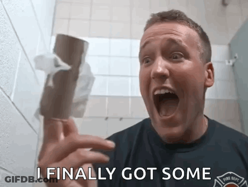 Man In Fire Dept Shirt Holding Toilet Paper Saying I Finally Got Some GIF