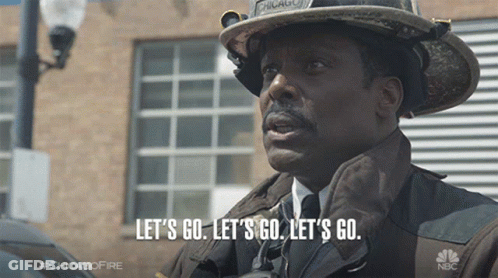 Man In Fireman Uniform Says Let's Go GIF