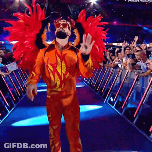 Man In Flaming Costume Walking Down Hallway GIF
