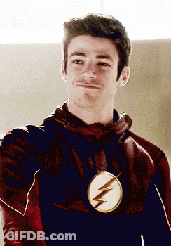 Man In Flash Costume Smiling GIF