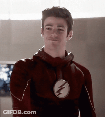 Man In Flash Costume Smiling GIF