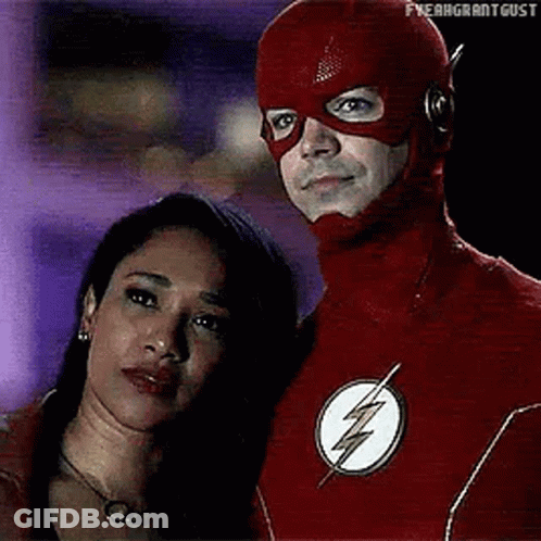 Man In Flash Suit Next To Woman GIF