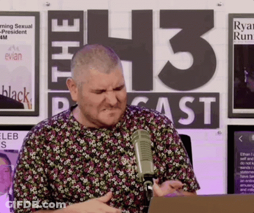 Man In Floral Shirt At Microphone The 43 Podcast GIF
