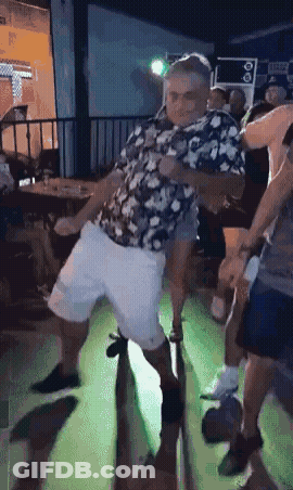 Man In Floral Shirt Dancing GIF
