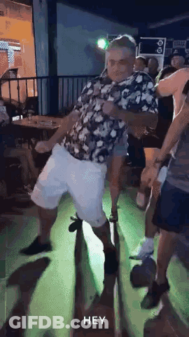 Man In Floral Shirt Dancing GIF
