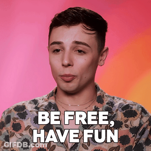 Man In Floral Shirt Saying Be Free Have Fun GIF