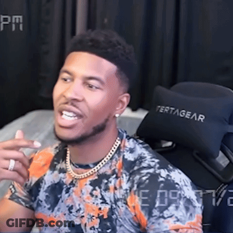 Man In Floral Shirt Sitting In Front Of Tertagear Chair GIF