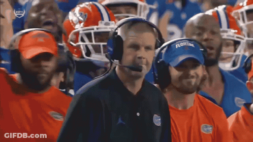 Man In Florida Shirt And Headphones Watching Football GIF