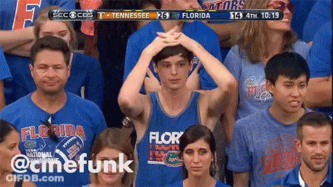Man In Florida Shirt Holding Head GIF