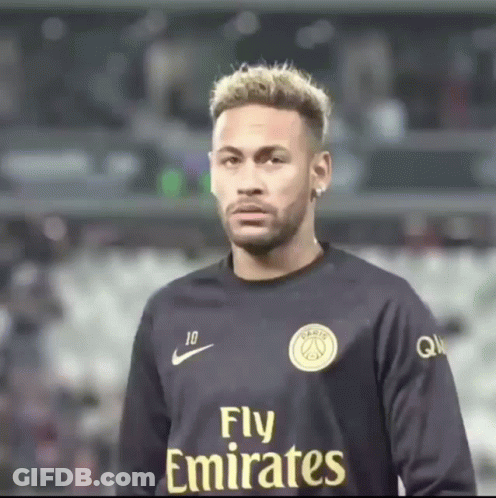 Man In Fly Emirates Jersey Looks At Camera GIF